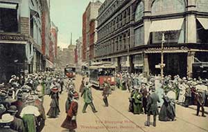Postcard showing Washington Street during the shopping hour.